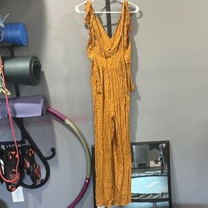 Orange Jumpsuit with Deep V-neck and Wide-leg Pants